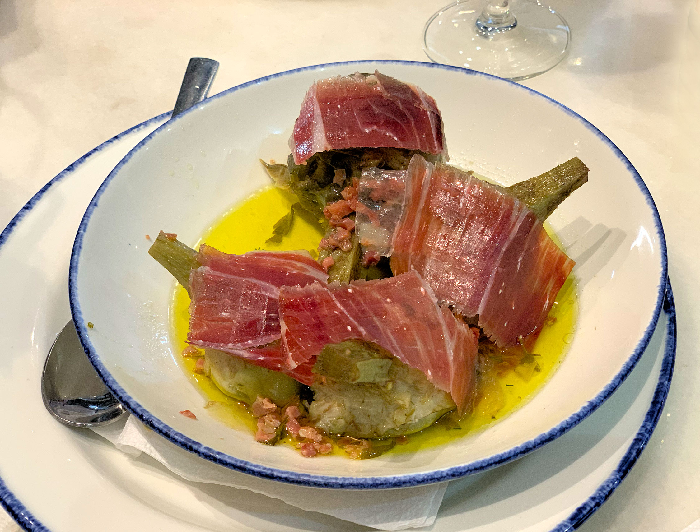 Artichokes confit in olive oil with Iberian ham